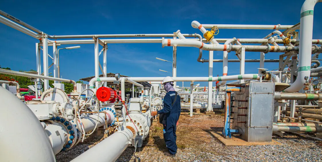 A technician is inspecting a pipeline